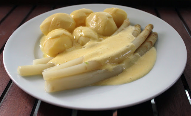 fresh, homemade hollandaise sauce with asparagus and potatoes